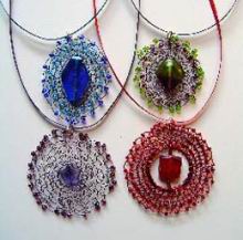 Stitched bead pendants on ribbon necklaces.jpg
